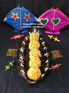 તલ મમરા નાં લાડુ (Til Mamara Ladoo Recipe In Gujarati) રેસીપી મુખ્ય ફોટો