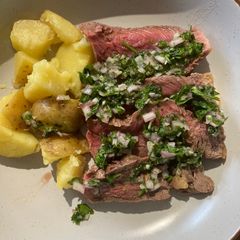 A picture of Roast Tomahawk steak with summer dressing #cookeverypart.