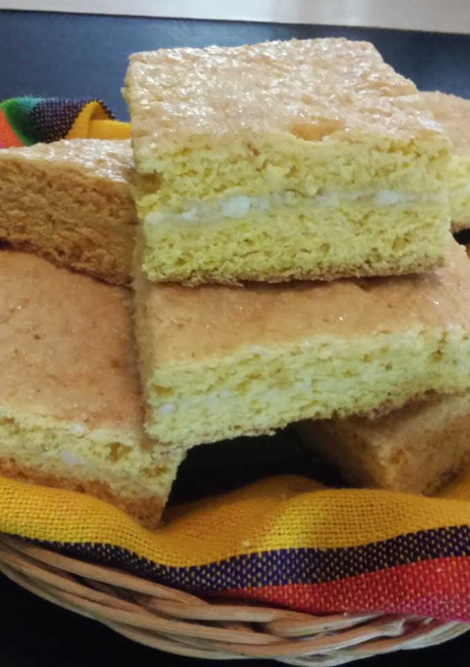 Una foto de Pastel relleno de queso y azúcar