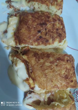 Una foto de Omelette de papá y jamón y queso.🥔