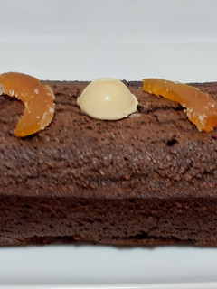 Una foto de Bizcocho de coco, almendra, chocolate, y naranja...🥧 🥥🍫🍊
