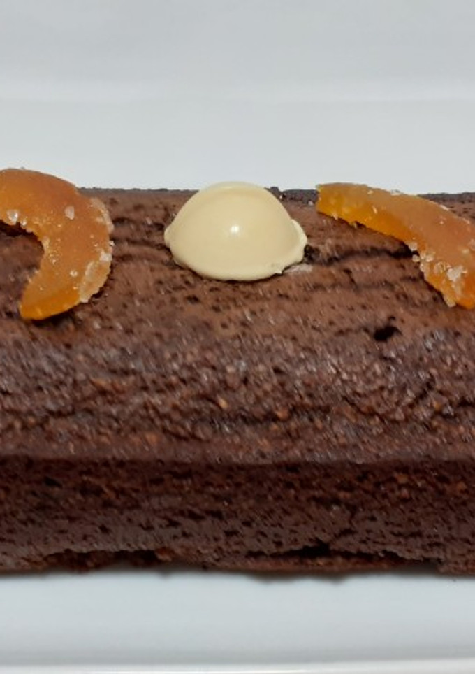 Una foto de Bizcocho de coco, almendra, chocolate, y naranja...🥧 🥥🍫🍊