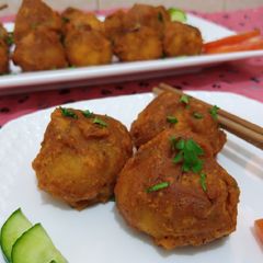 A picture of Chicken Tandoori Momos.