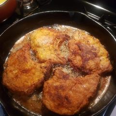 A picture of Country Pan fried pork chops.