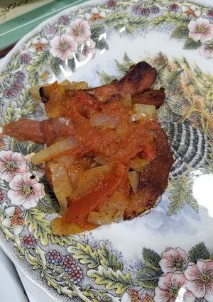 Una foto de Chuletas ahumadas con tomatada