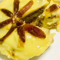 A picture of Dates and custard dessert.