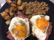 Una foto de ribs de cerdo con batata