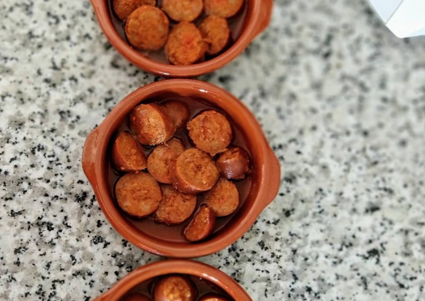 Chorizos a la sidra