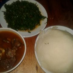 Ugali/greens/wet beef A picture of Ugali/greens/wet beef.