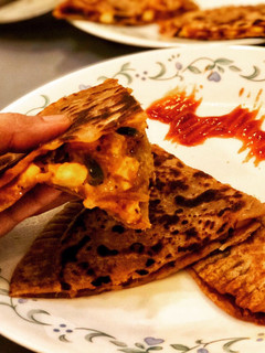 A picture of Calzone Pizza Parantha.