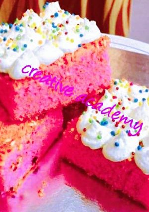 A picture of Strawberry cake with cream cheese.