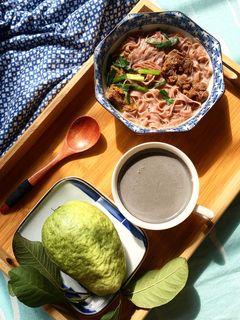 A picture of Brown Rice Noodles with Braised Beef.