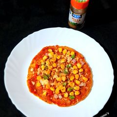 A picture of Thepla Pizza.