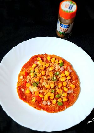 A picture of Thepla Pizza.