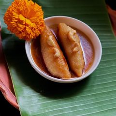 Rosomoti (Ranga Aloo’aur Pithe) A picture of Rosomoti (Ranga Aloo’aur Pithe).