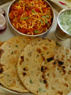 A picture of Noodles tomato curry#oneafrica.