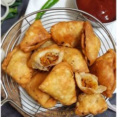 A picture of Bhujiya stuffed mini samosas.