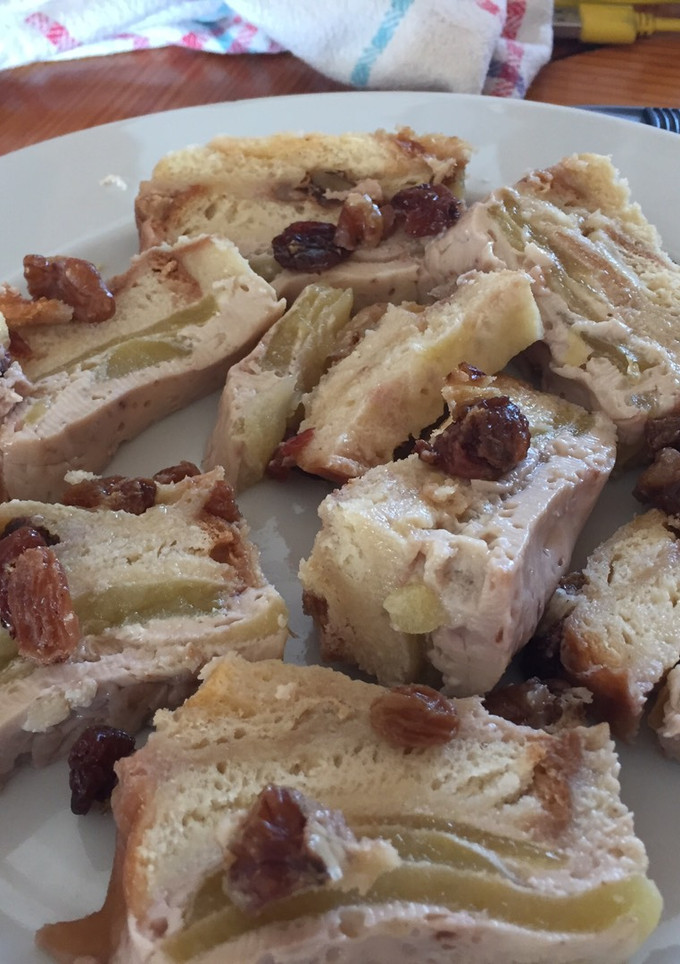 Una foto de Puding de manzanas, nueces y pasas al ron