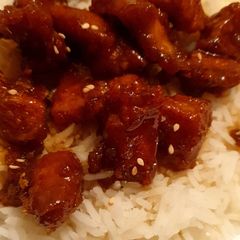A picture of Orange stir fry chicken.