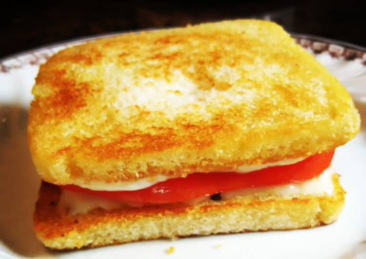Pan Bimbo templado con queso y tomates