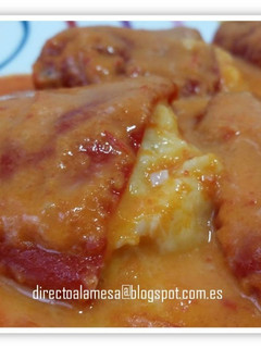 Una foto de Pimientos del piquillo rellenos de merluza y langostinos