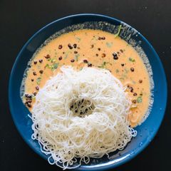 A picture of Idiyappam with Moore vathal curry.