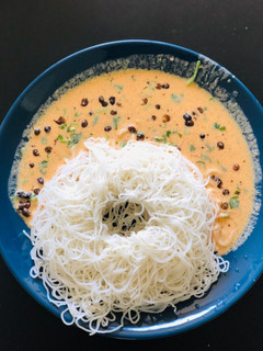 A picture of Idiyappam with Moore vathal curry.