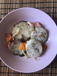 Una foto de Merluza al papillote con batata 🐟