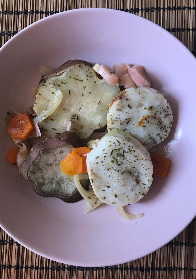 Una foto de Merluza al papillote con batata 🐟
