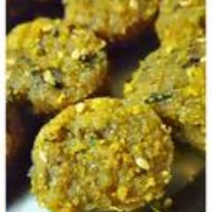 A picture of Oats & Malabar Spinach Muthiya/ Steamed Dumplings.
