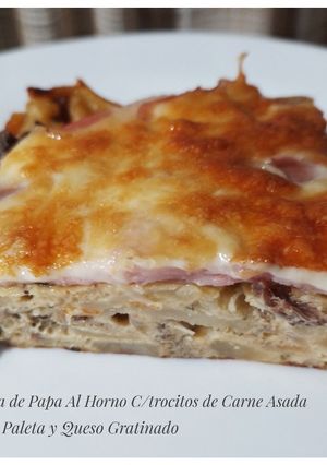 Una foto de Tortilla de papa al horno c/Trocitos de Carne asada _Paleta y Queso Gratinado_