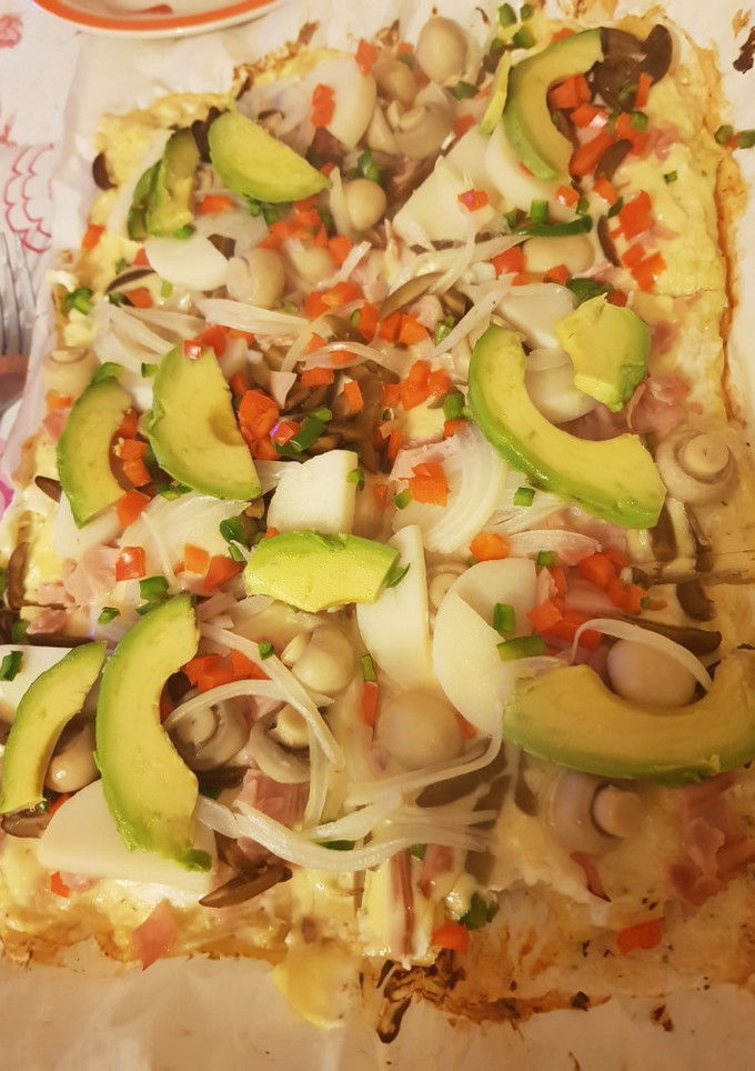 Una foto de Pizza grez con masa de pollo