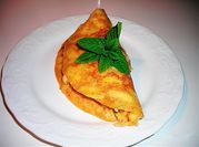 Una foto de blinis con fruta