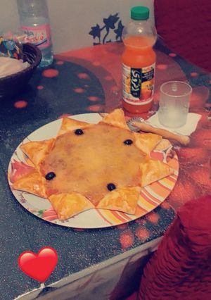 صورة لوصفة بيتزا مثل المحلات