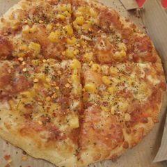A picture of Corn pizza.