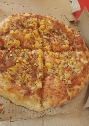A picture of Corn pizza.