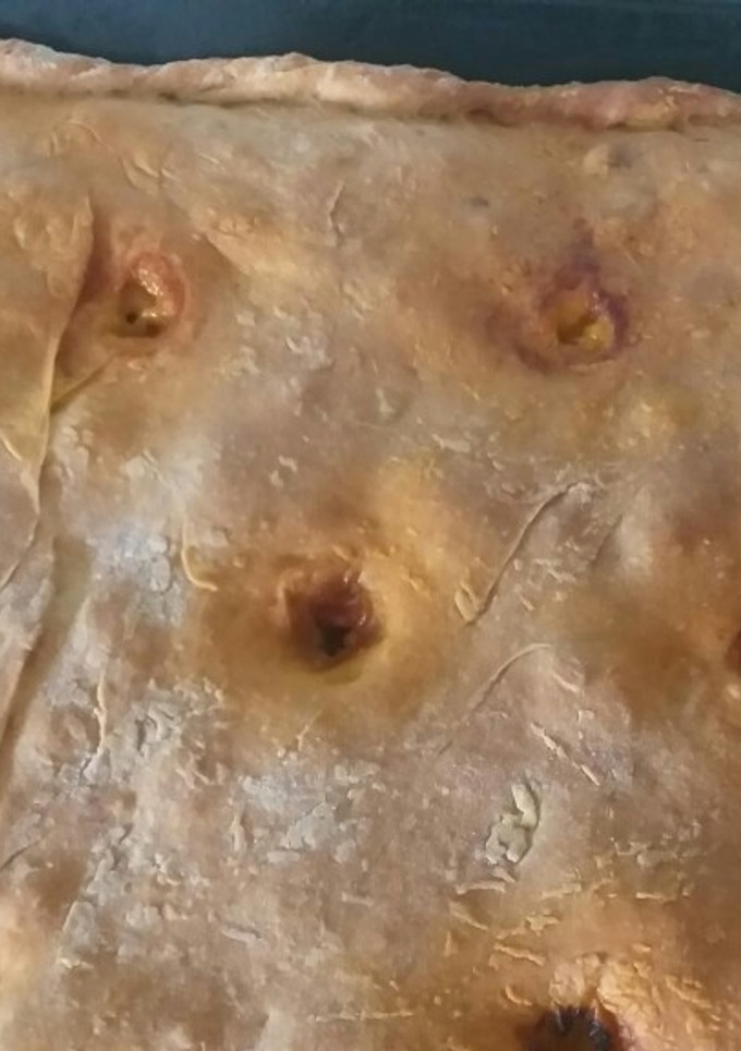 Una foto de Empanada de chorizo y panceta