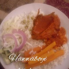 A picture of Peas Rice with chicken stew.