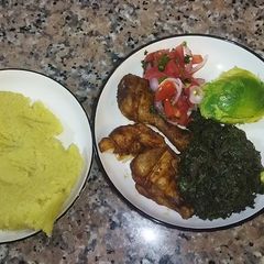 A picture of Grilled Chicken with Veggies and Ugali.