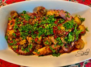 Foto de Polvo com arroz com açafrão e curry