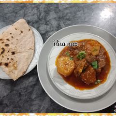 A picture of ALOO GOSHT WITH Roti.
