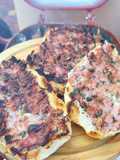 Lanche de linguiça na brasa