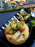 Daliya couscous with curry leaf pesto crusted potatoes