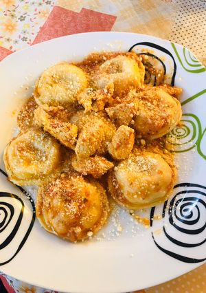 Una foto de Sorrentinos de jamón y queso