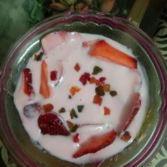 Strawberries in custard sauce A picture of Strawberries in custard sauce.