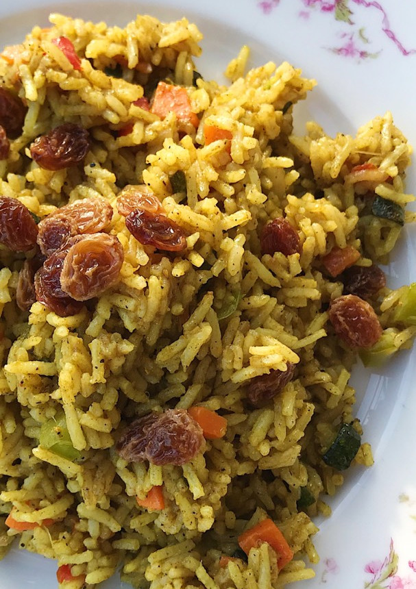 Una foto de Arroz al ras el hanout con verduras