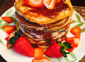 Una foto de Hot cakes a la antigua con nutella💖💖