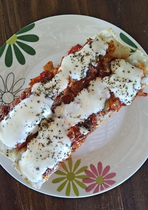 Una foto de Canelones de pollo y espinaca