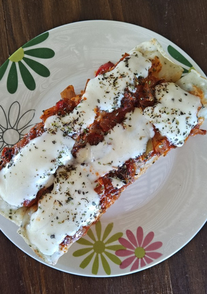 Una foto de Canelones de pollo y espinaca