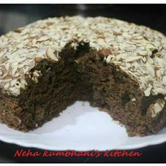A picture of Eggless Roasted almond chocolate cake.
